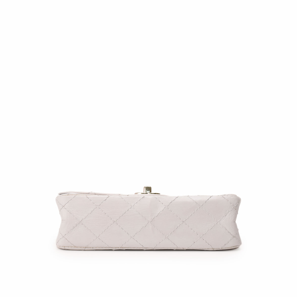 White quilted leather clutch bag with silver clasp, curated Pre-loved Luxury by Myluxe in Helsinki.