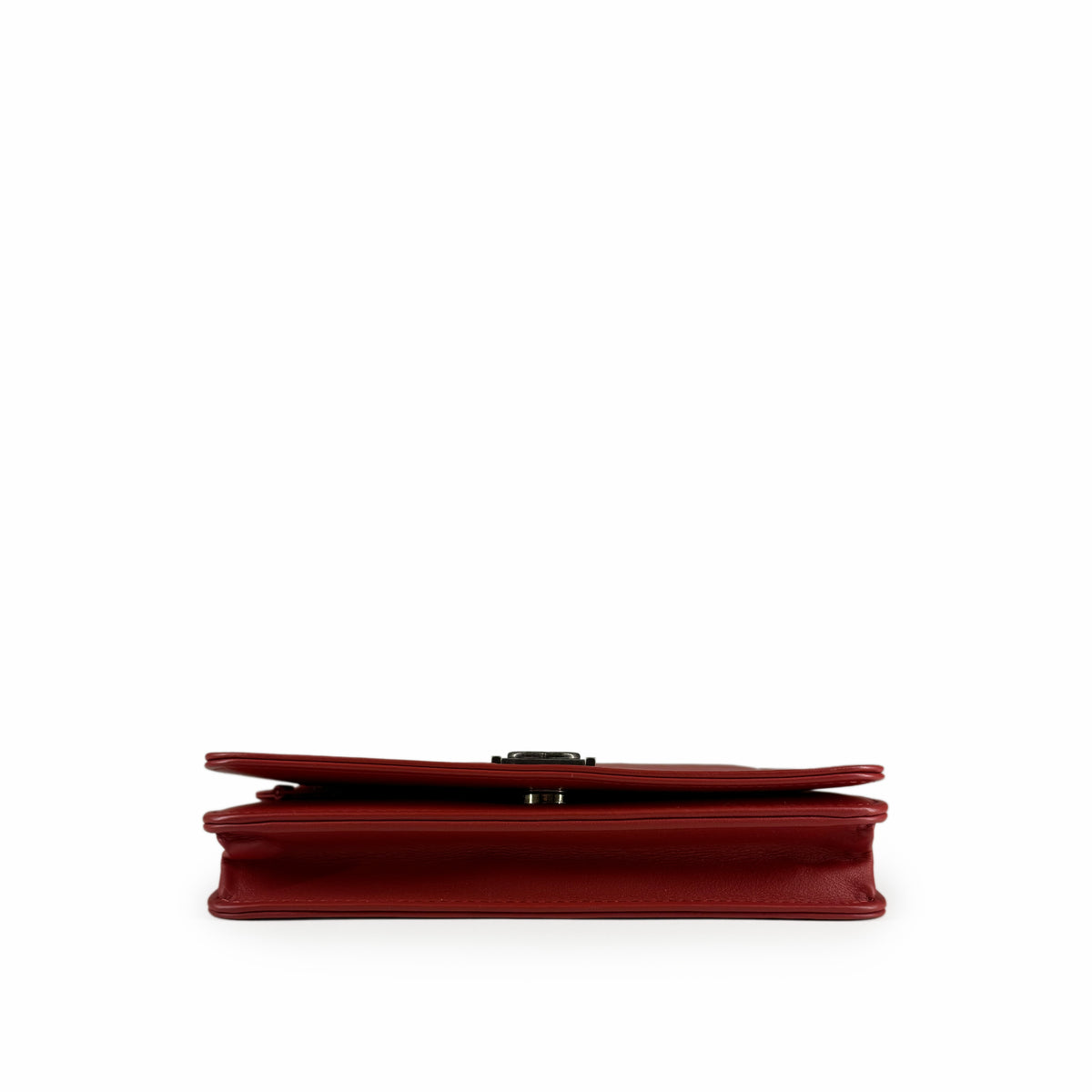 Slim burgundy leather clutch bag with gold-tone clasp, curated Pre-loved Luxury by Myluxe in Helsinki.