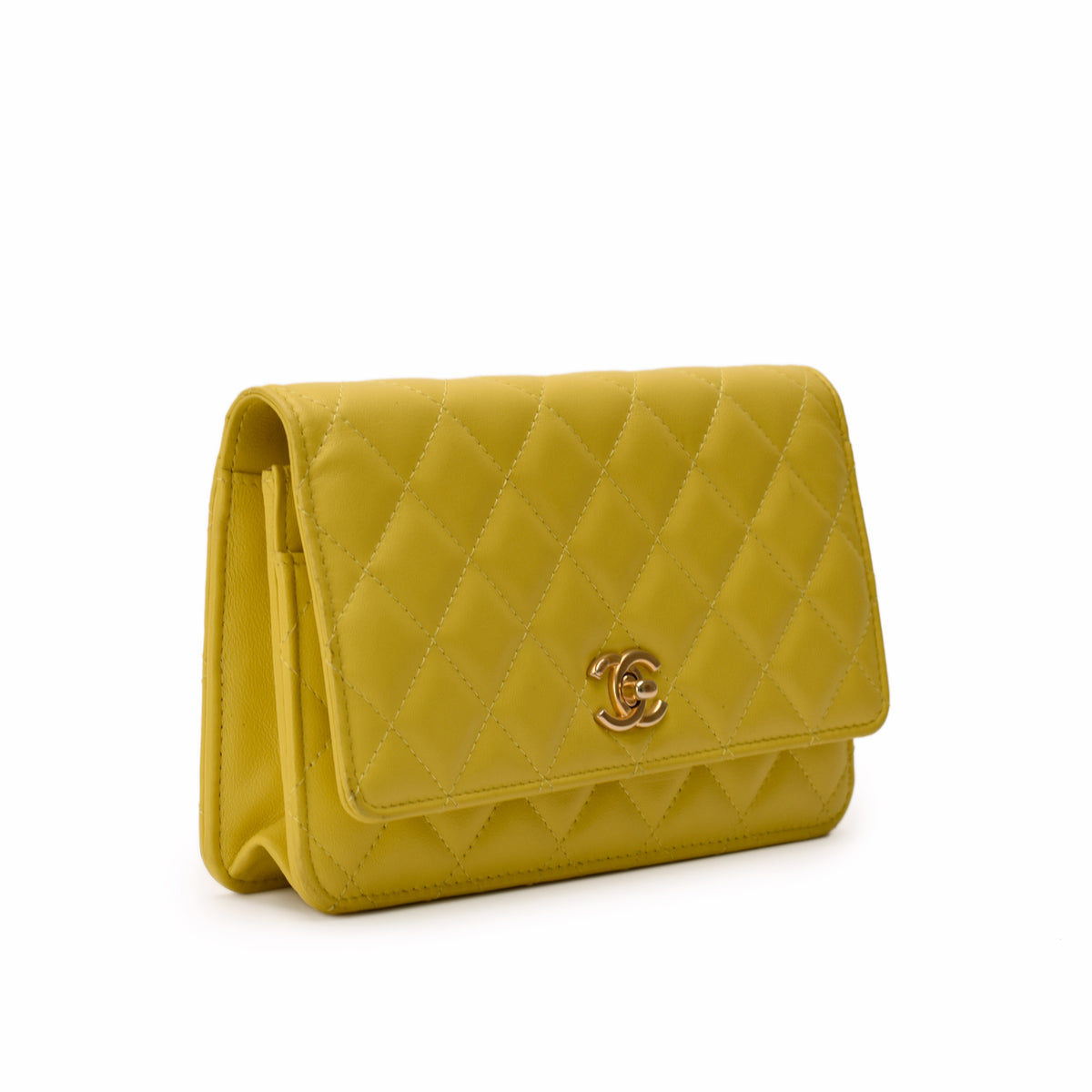 Yellow quilted lambskin Chanel flap wallet with gold-tone hardware, curated Pre-loved Luxury by Myluxe in Helsinki.