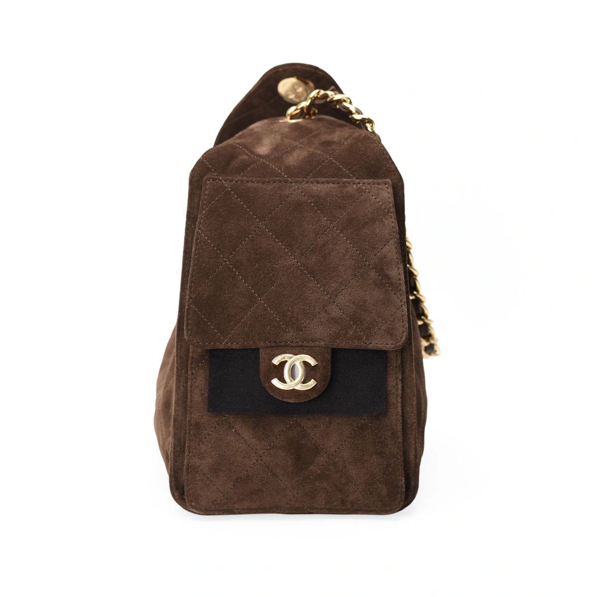 Chanel 25 small bag in brown quilted suede with gold hardware. curated Pre-loved Luxury by Myluxe in Helsinki.