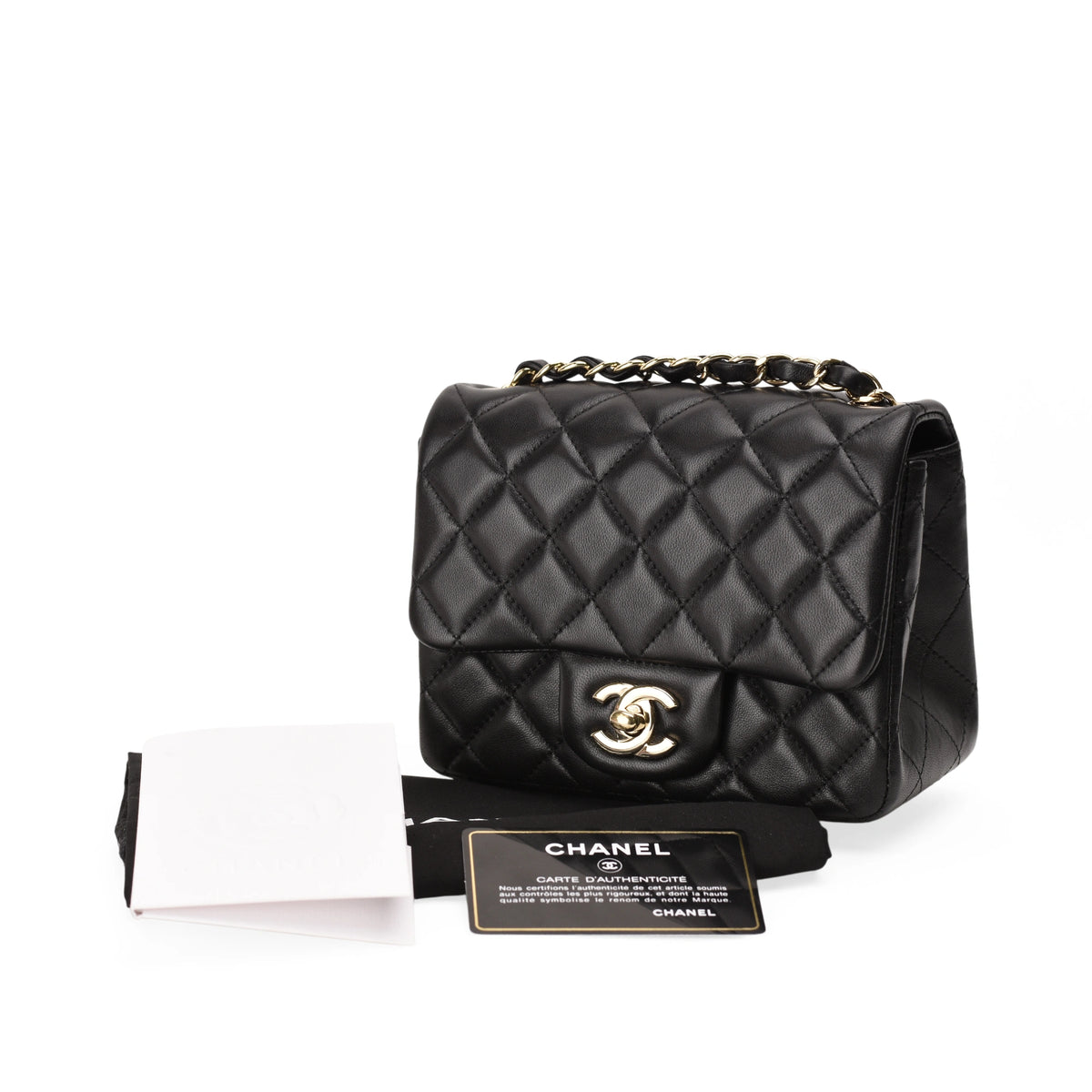 Black quilted leather Chanel handbag with gold chain strap. curated Pre-loved Luxury by Myluxe in Helsinki.