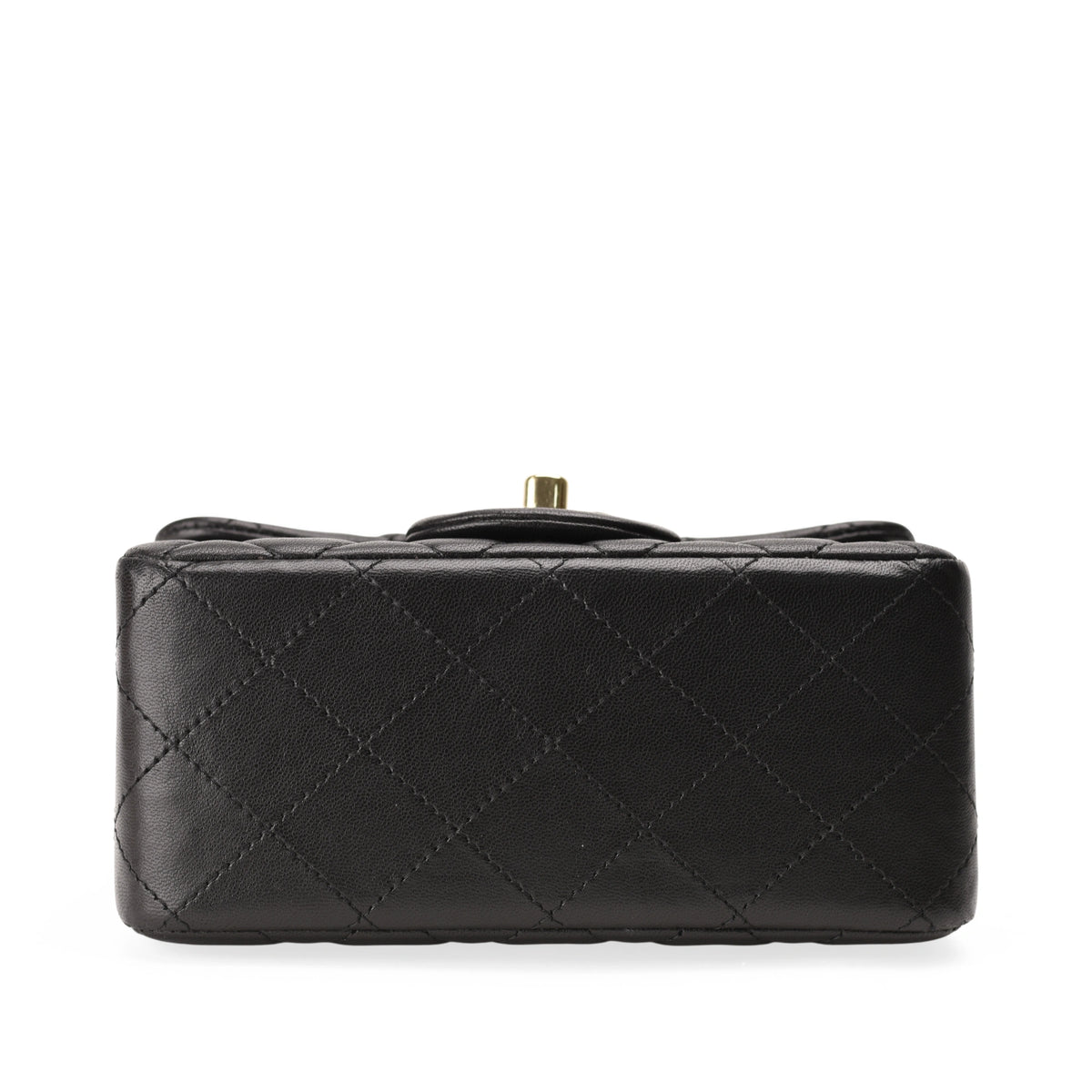 Black quilted leather Chanel clutch with gold-tone clasp. curated Pre-loved Luxury by Myluxe in Helsinki.