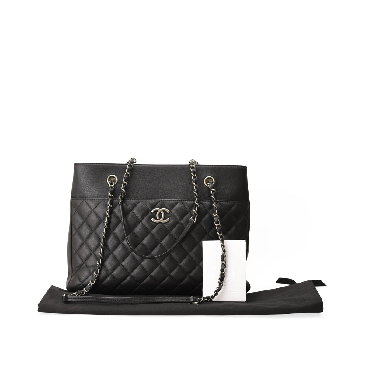 Chanel Urban Companion black caviar quilted shopping tote with RHW chain handles. Curated Pre-loved Luxury by Myluxe in Helsinki.