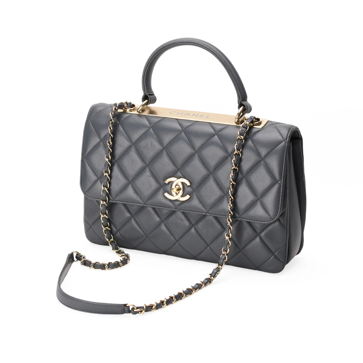 Chanel quilted black leather Trendy CC medium handbag with gold-tone hardware. curated Pre-loved Luxury by Myluxe in Helsinki.
