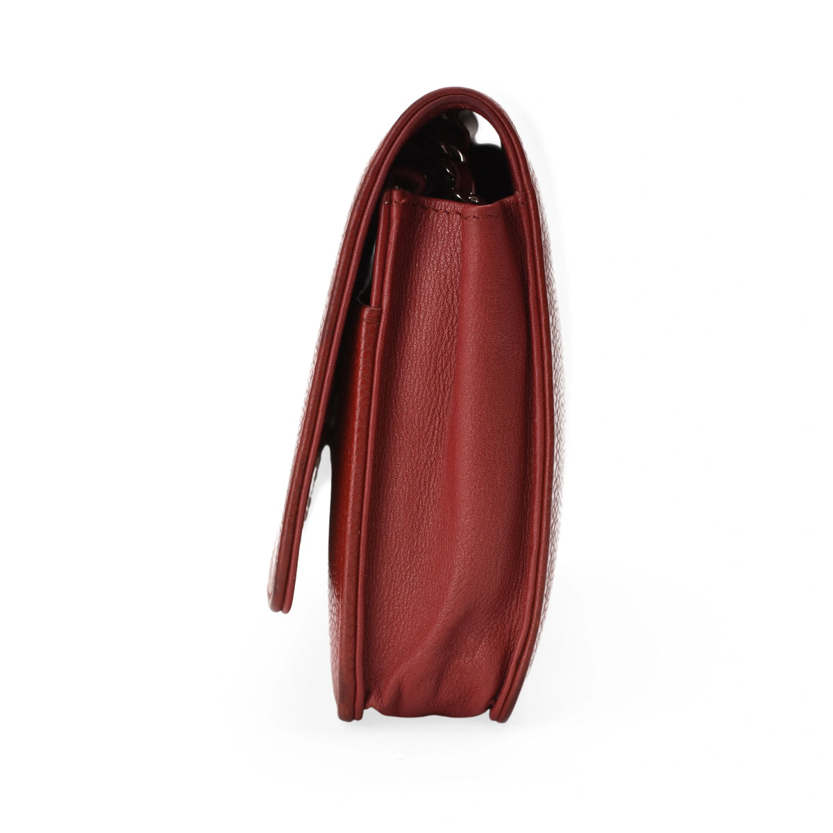 Side view of a Chanel red caviar leather wallet on chain. curated Pre-loved Luxury by Myluxe in Helsinki.