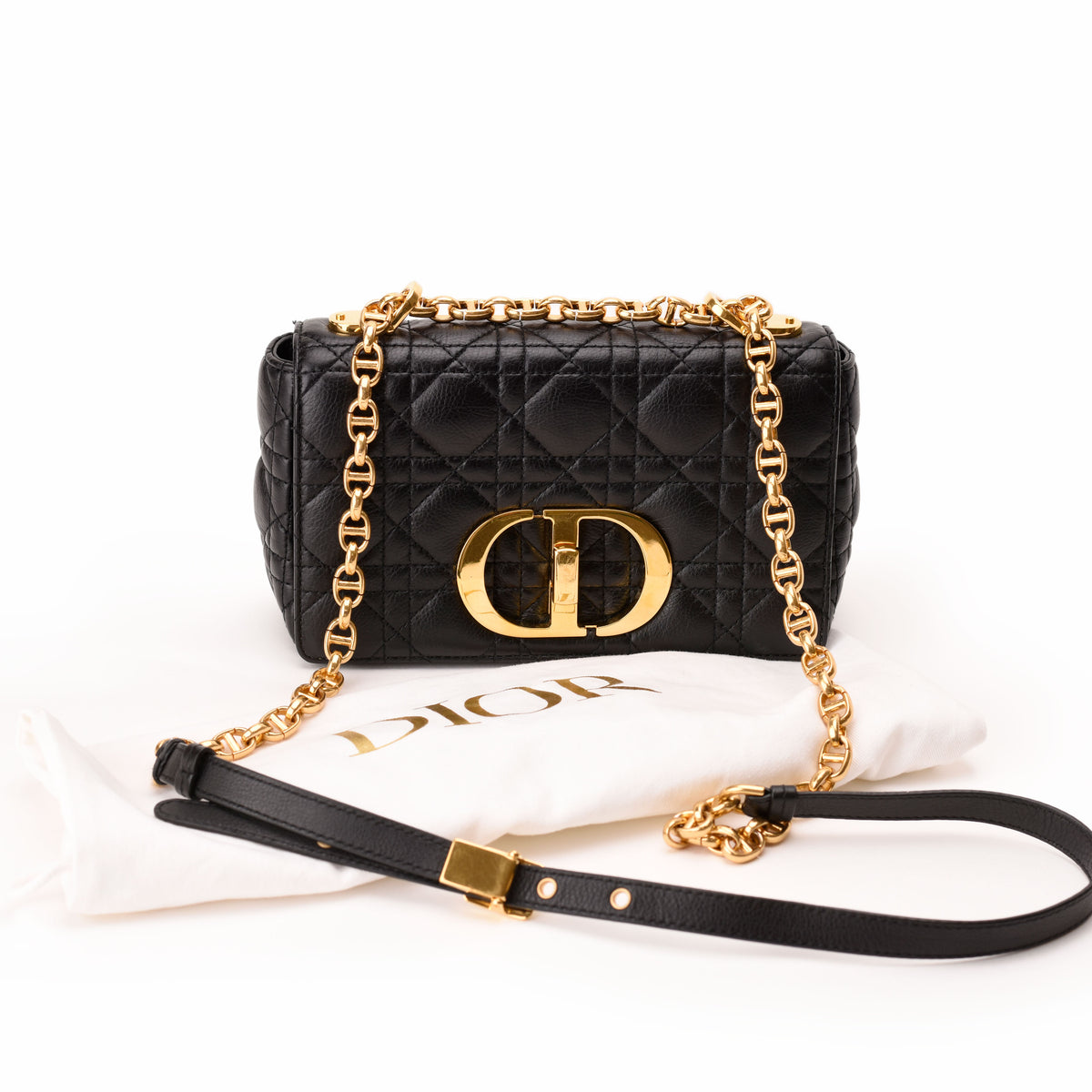 Black quilted leather Dior handbag with gold-tone chain and CD logo. curated Pre-loved Luxury by Myluxe in Helsinki.