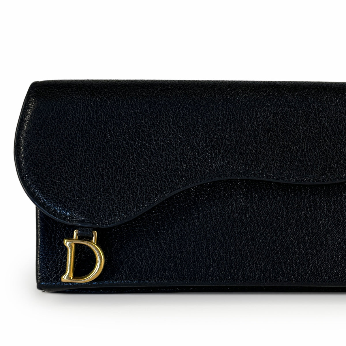 Black grained leather clutch with gold-tone CD logo, curated Pre-loved Luxury by Myluxe in Helsinki.