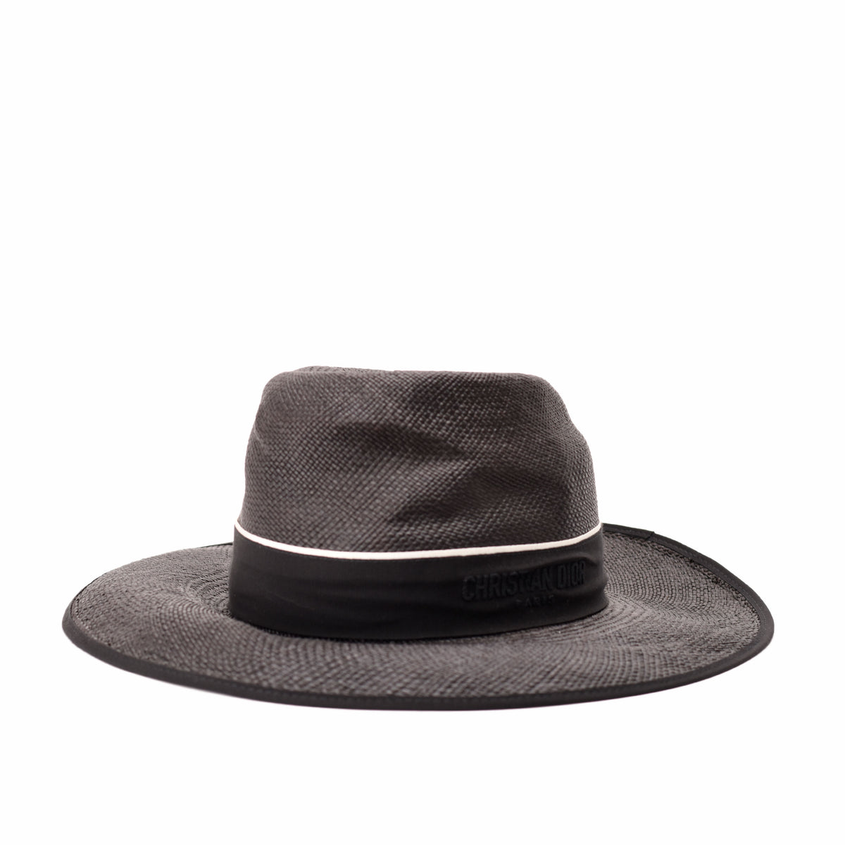 Black woven straw Christian Dior wide-brimmed hat, curated Pre-loved Luxury by Myluxe in Helsinki.