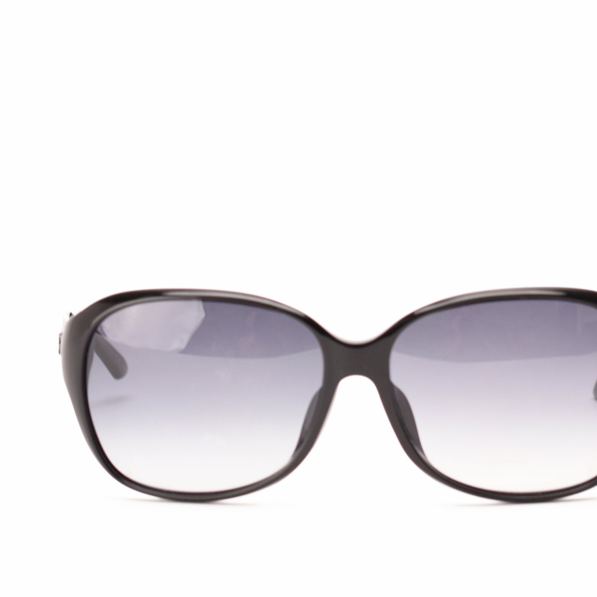 Black oversized designer sunglasses with gradient tinted lenses, curated Pre-loved Luxury by Myluxe in Helsinki.