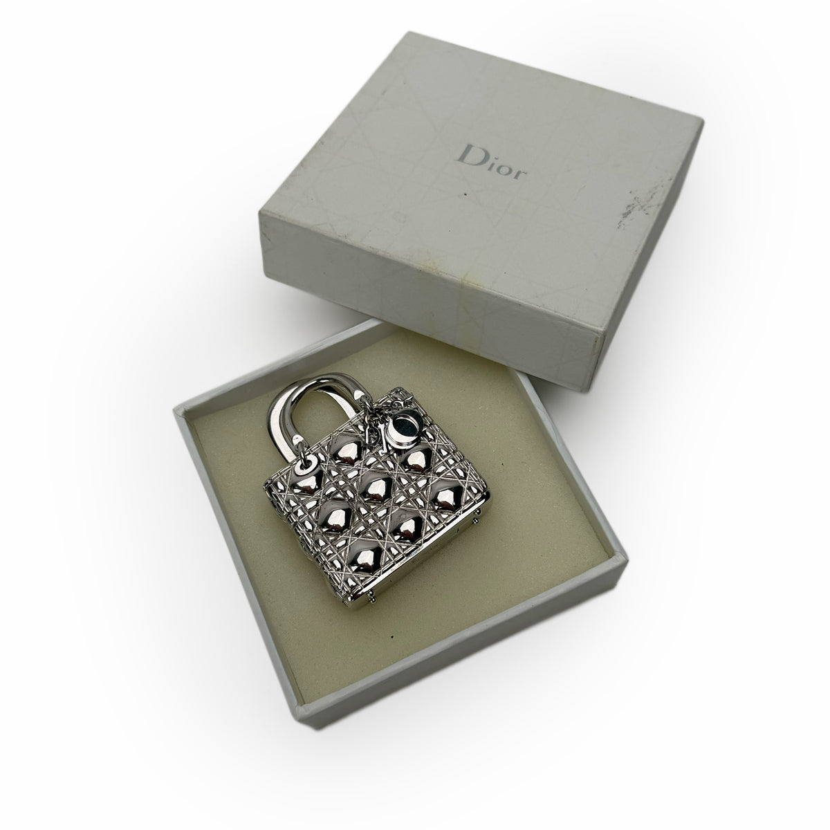 Silver-tone Dior metal padlock charm with crystal embellishments, curated Pre-loved Luxury by Myluxe in Helsinki.