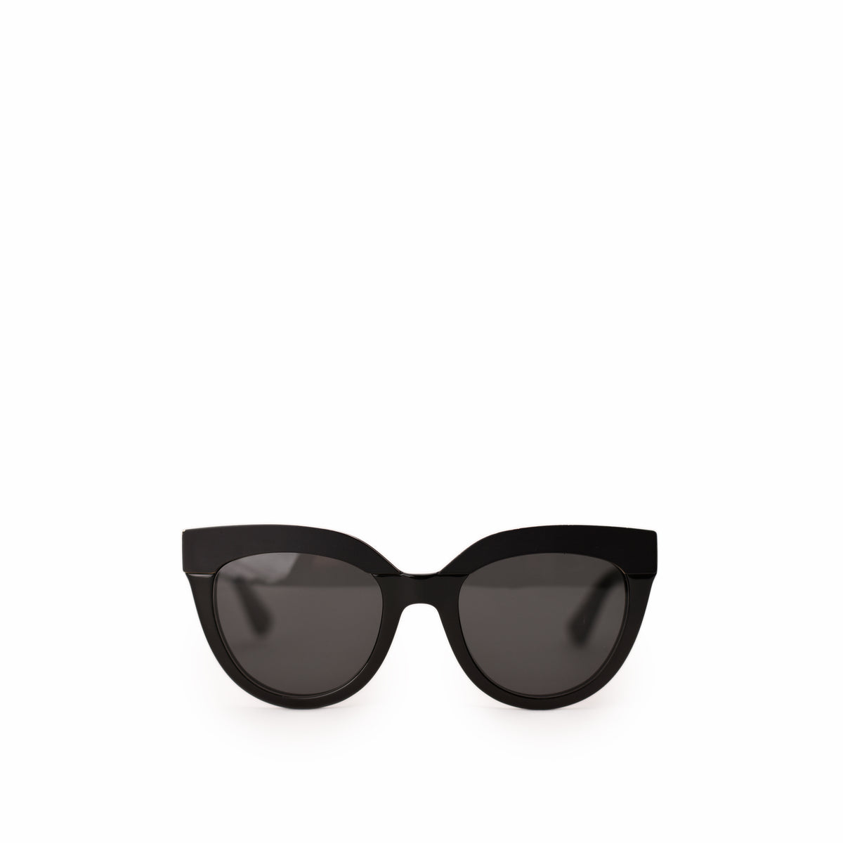 Black cat-eye designer sunglasses with dark tinted lenses. curated Pre-loved Luxury by Myluxe in Helsinki.