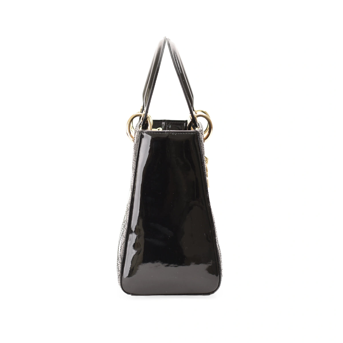 Black patent leather luxury handbag with gold-tone hardware. curated Pre-loved Luxury by Myluxe in Helsinki.