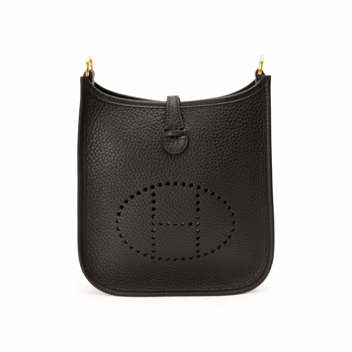 Black leather Hermès saddle bag with perforated H logo. Curated Pre-loved Luxury by Myluxe in Helsinki.