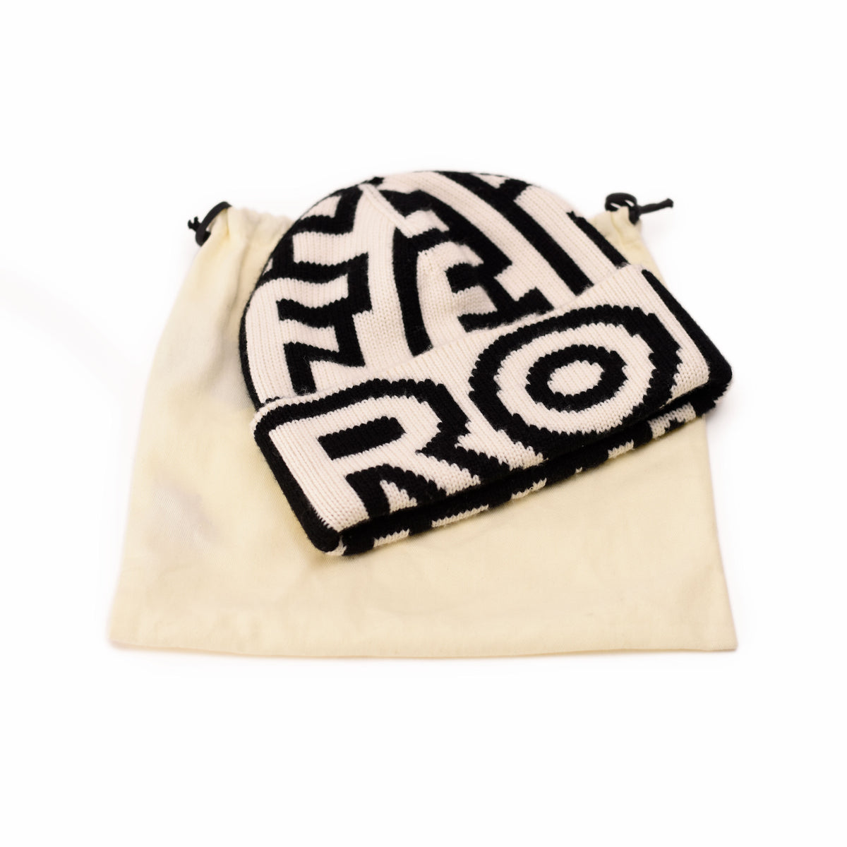 Black and cream knit Margiela logo beanie hat. curated Pre-loved Luxury by Myluxe in Helsinki.