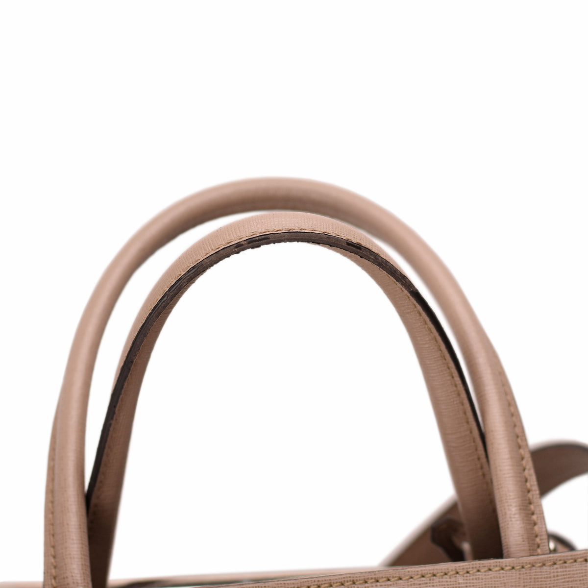 Beige leather handbag top handles. curated Pre-loved Luxury by Myluxe in Helsinki.