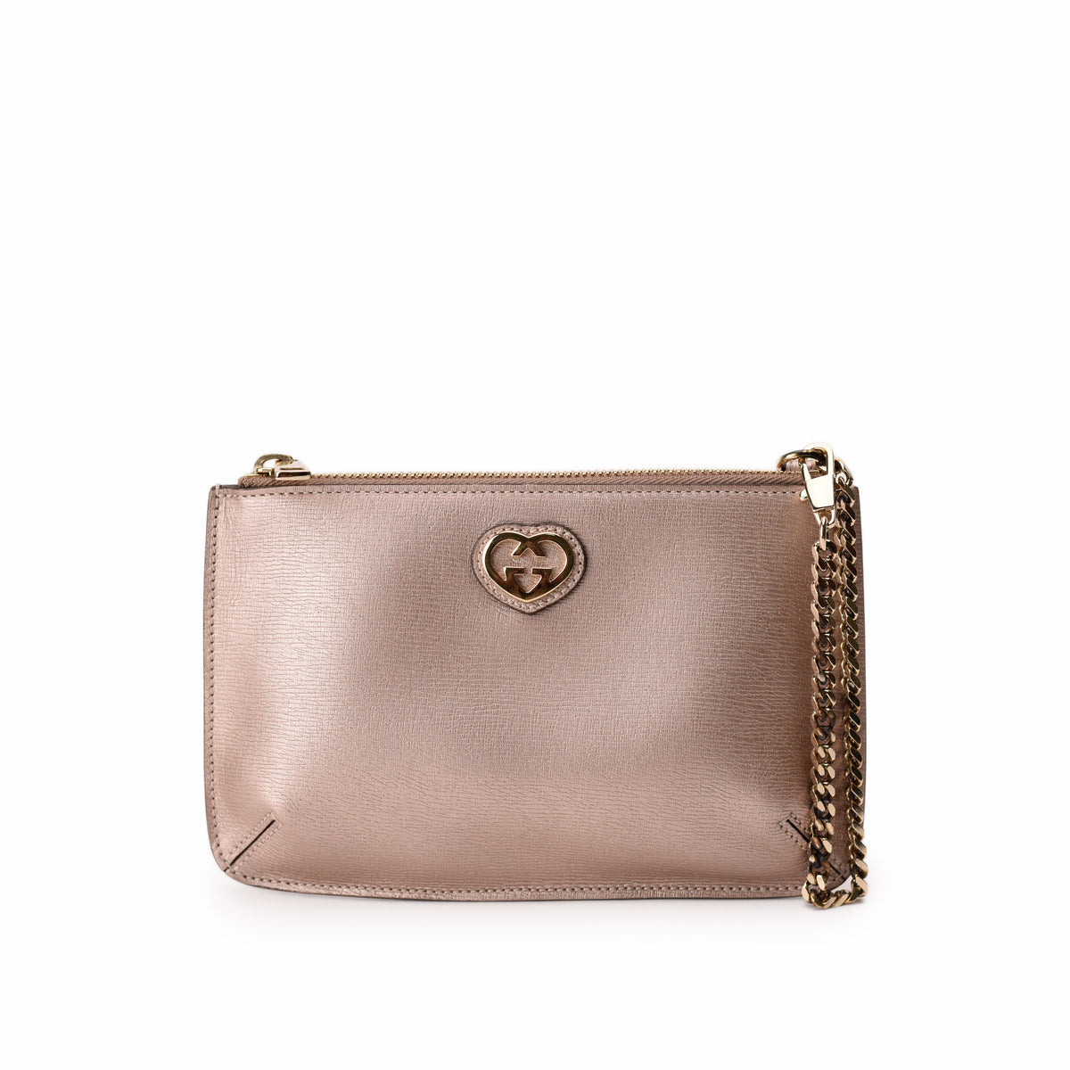 Gucci metallic rose gold leather crossbody bag with heart logo. curated Pre-loved Luxury by Myluxe in Helsinki.