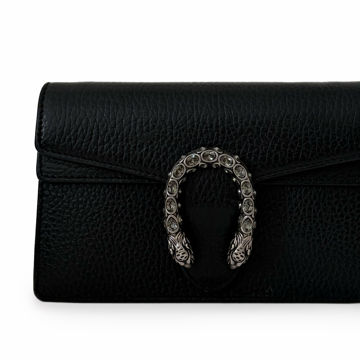 Black grained leather clutch with a silver horseshoe crystal buckle, curated Pre-loved Luxury by Myluxe in Helsinki.