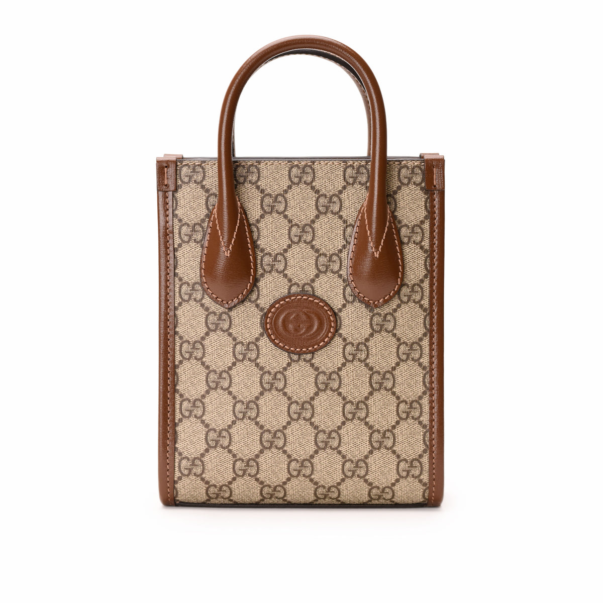 Gucci Interlocking G Mini Tote Bag featuring GG Supreme Canvas with leather handles and gold-tone hardware.