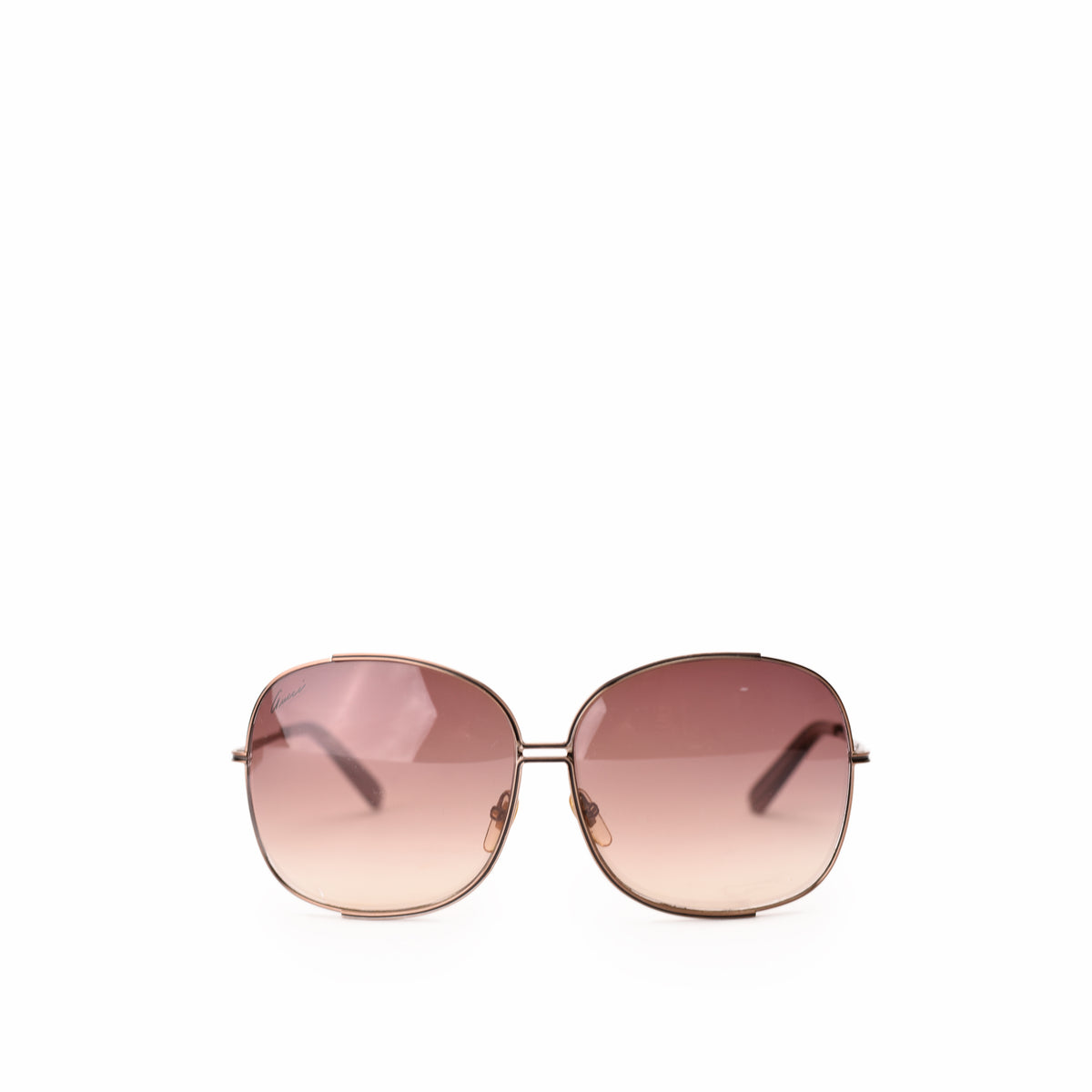 Gold-tone metal frame sunglasses with brown gradient lenses, curated Pre-loved Luxury by Myluxe in Helsinki.