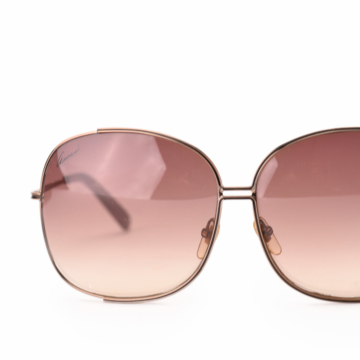 Gucci oversized sunglasses with gold-tone frames and brown gradient lenses, curated Pre-loved Luxury by Myluxe in Helsinki.