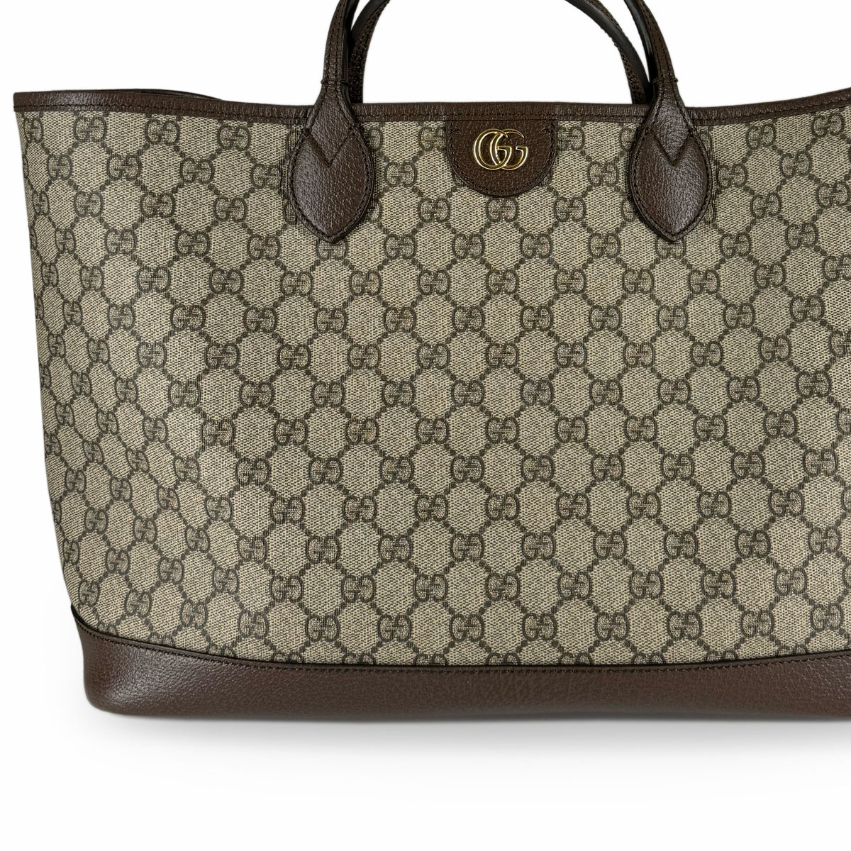Gucci GG monogram canvas tote bag with brown leather trim and gold hardware, curated Pre-loved Luxury by Myluxe in Helsinki.