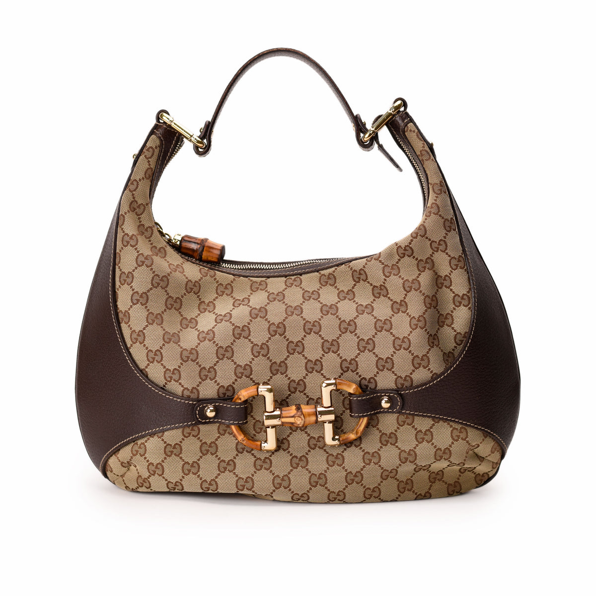 Gucci monogram canvas and brown leather hobo bag with bamboo hardware. curated Pre-loved Luxury by Myluxe in Helsinki.