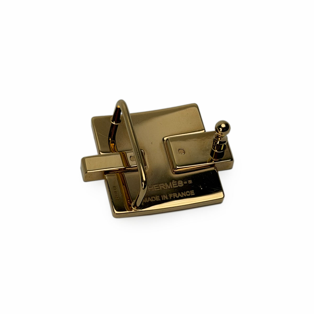 Gold-toned Hermès metal buckle with engraved Made in France detail, curated Pre-loved Luxury by Myluxe in Helsinki.