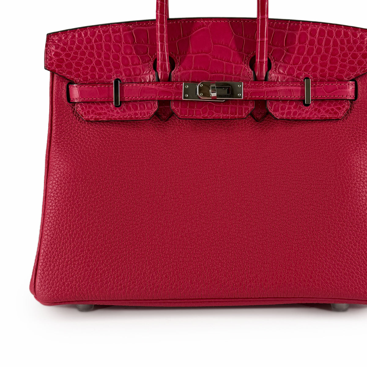 Hermès Birkin 25 handbag in Framboise Touch leather with gold hardware, showcasing its elegant design and luxurious craftsmanship.