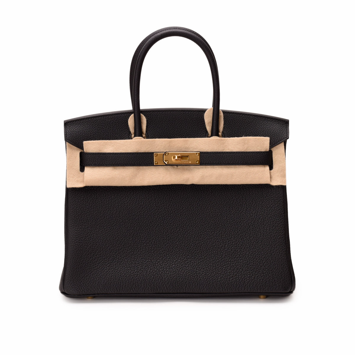 Black pebbled leather Hermès handbag with gold hardware, curated Pre-loved Luxury by Myluxe in Helsinki.