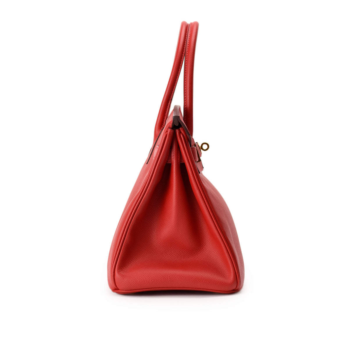 Red leather Hermès handbag with top handles and gold hardware. curated Pre-loved Luxury by Myluxe in Helsinki.