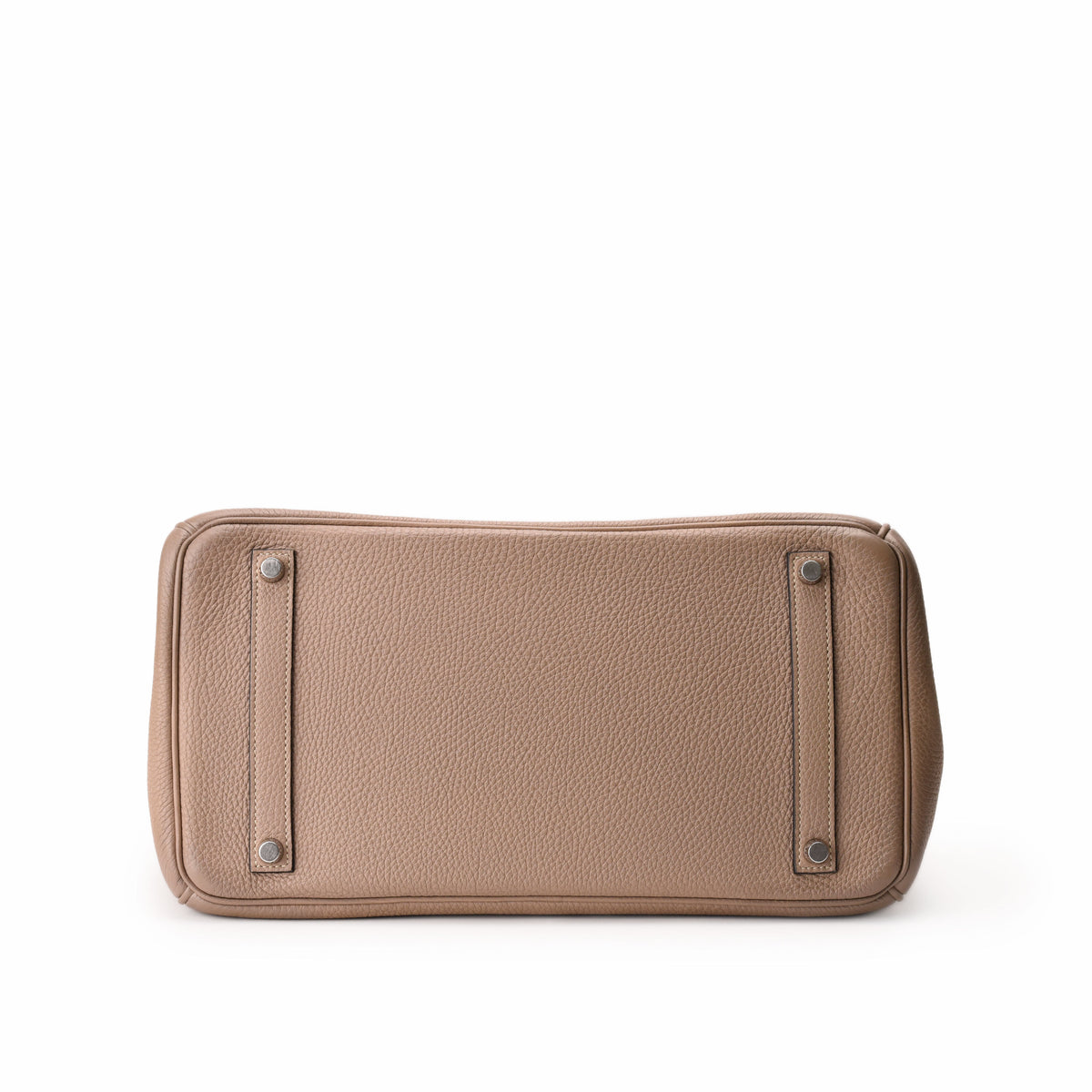 Tan pebbled leather luxury handbag base with metal studs. curated Pre-loved Luxury by Myluxe in Helsinki.
