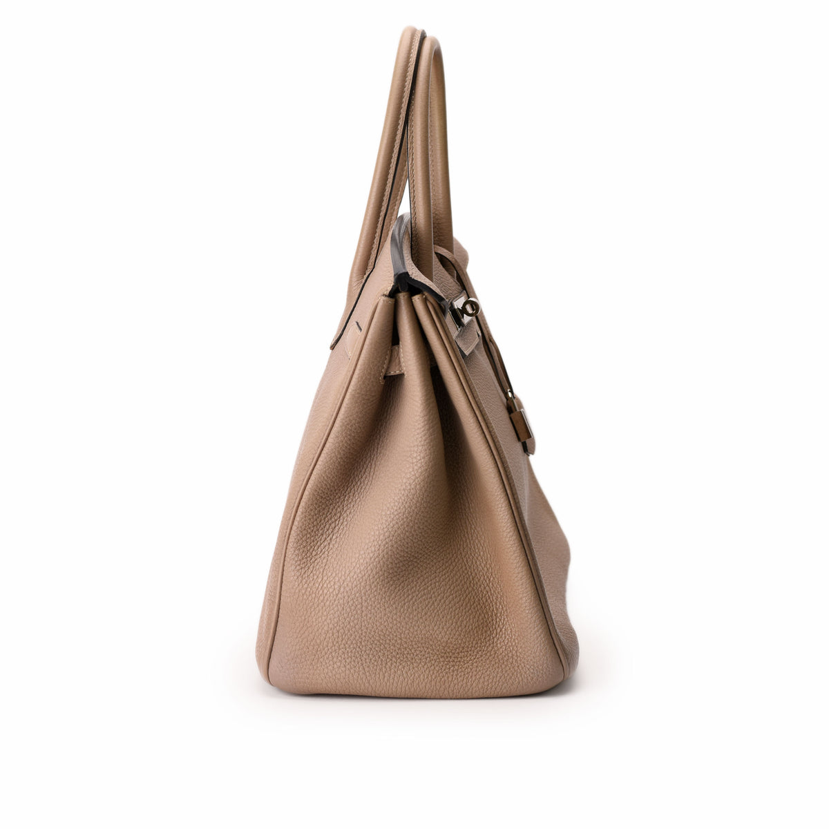 Tan grained leather luxury handbag with elegant top handles. Curated Pre-loved Luxury by Myluxe in Helsinki.