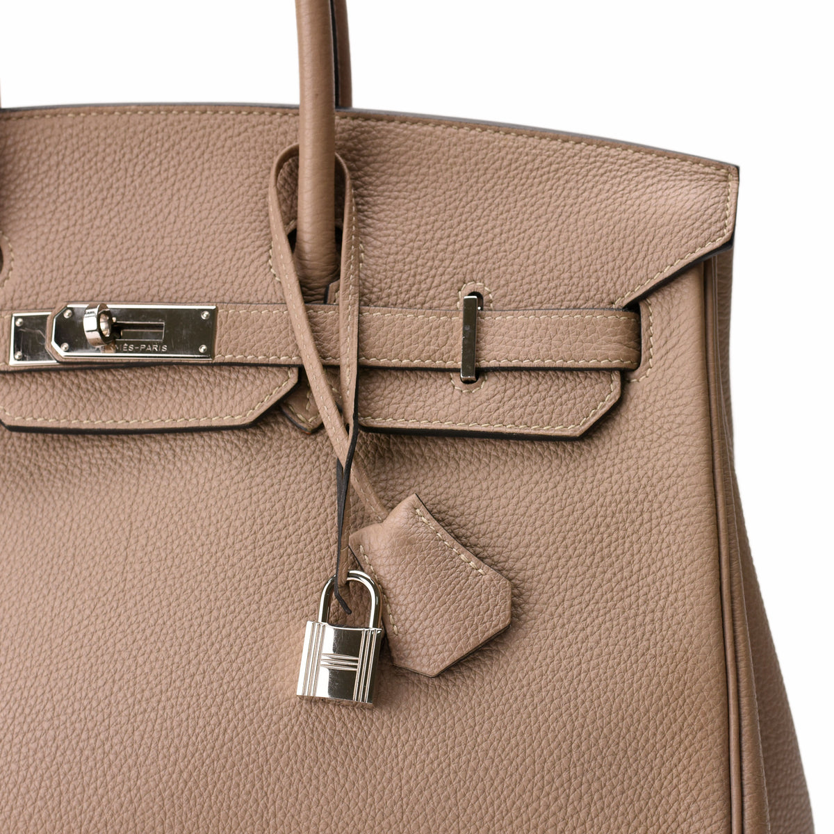 Hermès taupe grained leather handbag with silver hardware. curated Pre-loved Luxury by Myluxe in Helsinki.