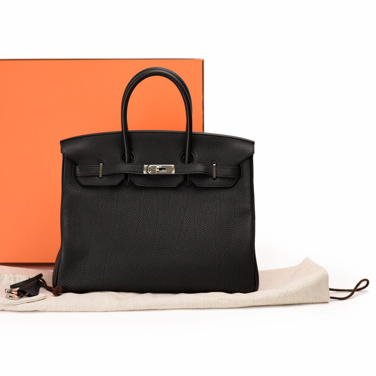 Black Togo leather Hermès Birkin handbag with silver hardware. curated Pre-loved Luxury by Myluxe in Helsinki.