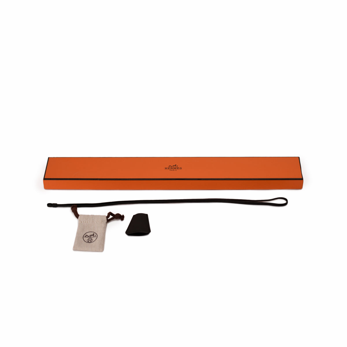 Hermès orange signature box with dust bag and accessory. curated Pre-loved Luxury by Myluxe in Helsinki.