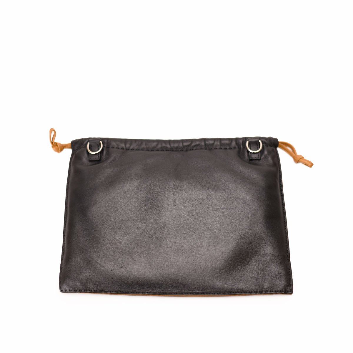 Black leather drawstring pouch bag with tan accents. curated Pre-loved Luxury by Myluxe in Helsinki.