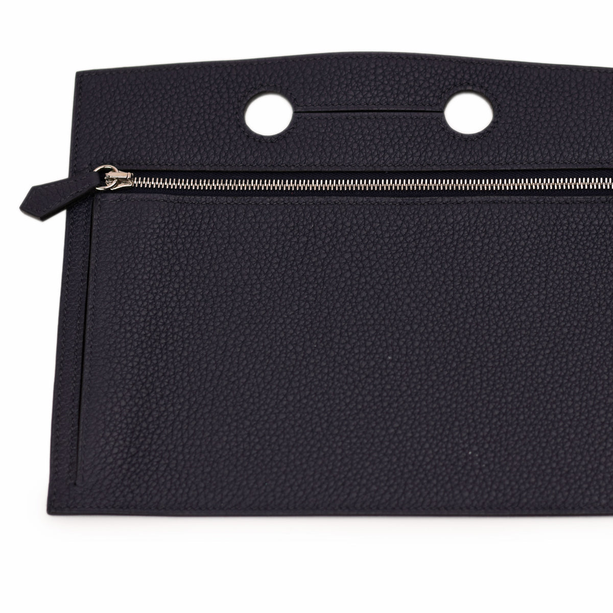 Black pebbled leather clutch with silver zipper, curated Pre-loved Luxury by Myluxe in Helsinki.