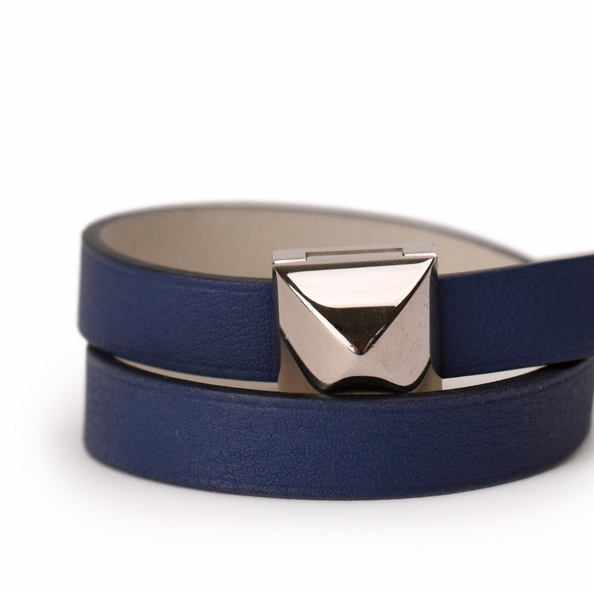 Navy blue leather wrap bracelet with silver-tone geometric metal clasp. curated Pre-loved Luxury by Myluxe in Helsinki.