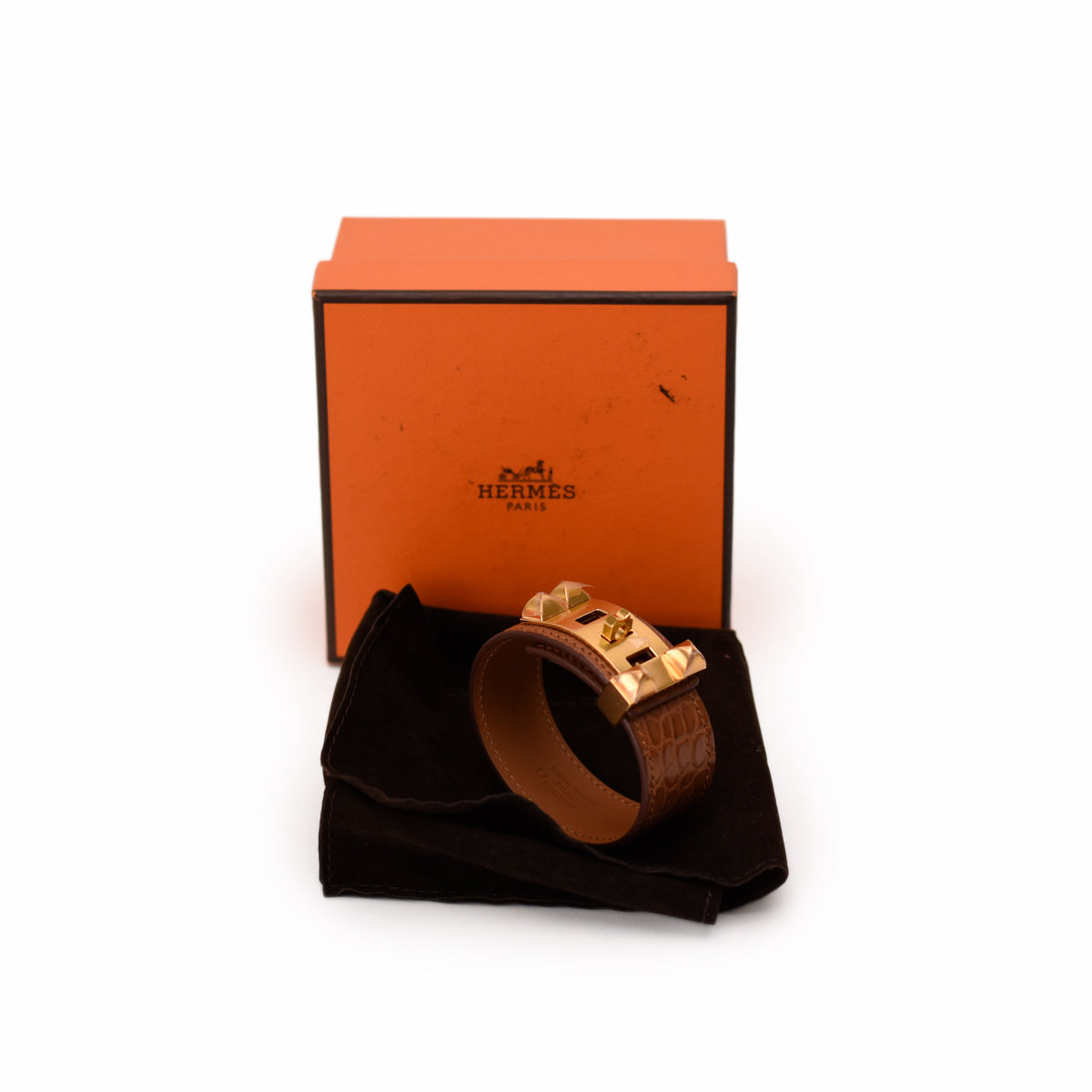 Hermès brown crocodile leather bracelet with gold hardware. curated Pre-loved Luxury by Myluxe in Helsinki.
