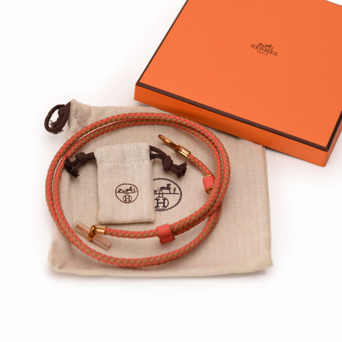 Hermès orange leather braided choker necklace with gold-tone hardware. curated Pre-loved Luxury by Myluxe in Helsinki.