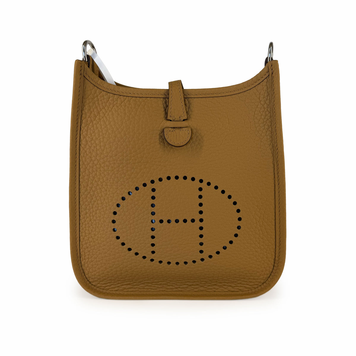 Tan leather bucket bag with perforated H logo detail, curated Pre-loved Luxury by Myluxe in Helsinki.