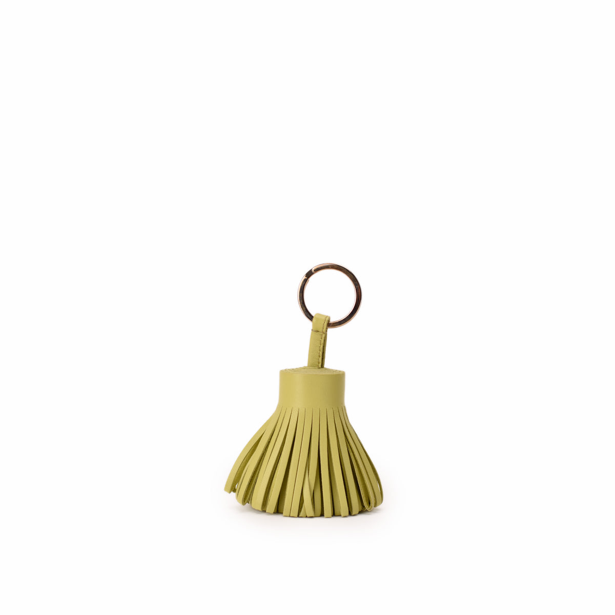 Lime green leather tassel keychain accessory. curated Pre-loved Luxury by Myluxe in Helsinki.