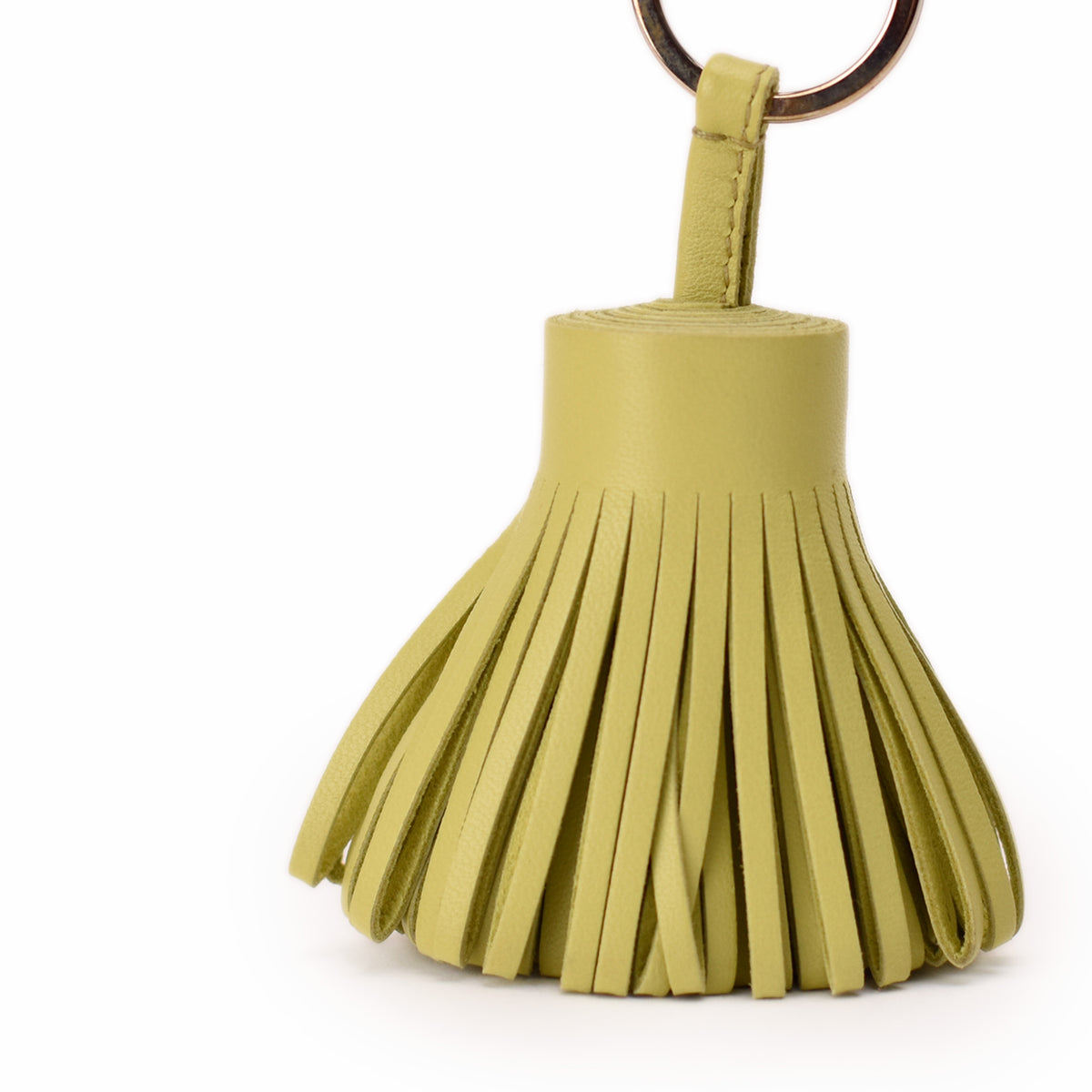 Olive green leather fringe tassel keychain accessory. curated Pre-loved Luxury by Myluxe in Helsinki.