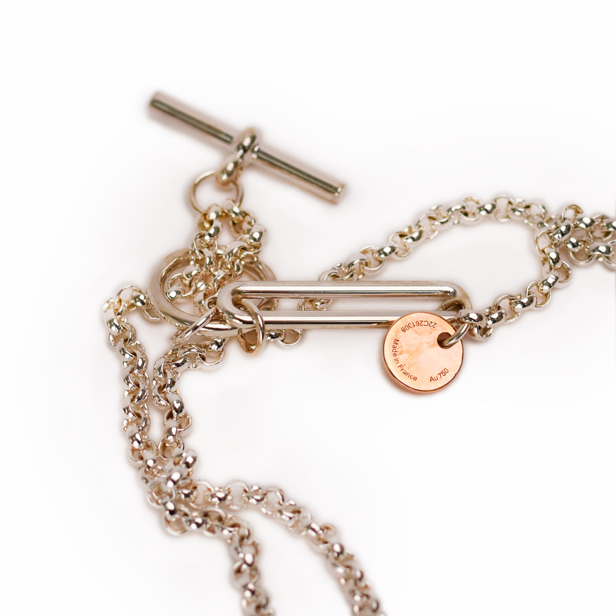 Silver tone T-bar toggle clasp chain necklace with gold-colored circular charm. curated Pre-loved Luxury by Myluxe in Helsinki.