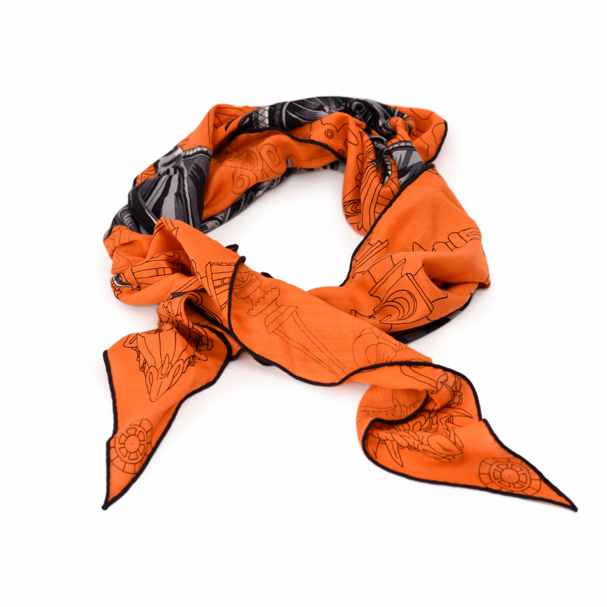 Orange silk scarf with black graphic prints, curated Pre-loved Luxury by Myluxe in Helsinki.