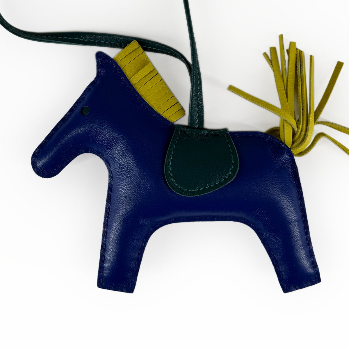 Blue leather horse-shaped crossbody bag with yellow fringe details, curated Pre-loved Luxury by Myluxe in Helsinki.