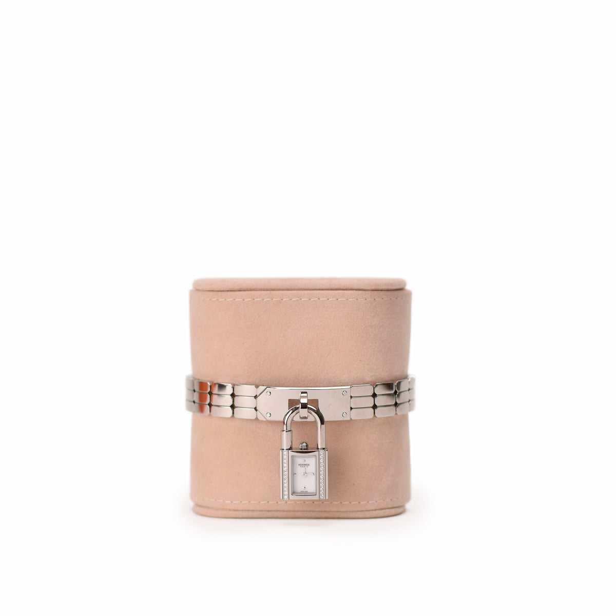 Hermès pink suede cylindrical hat box with silver metal hardware. curated Pre-loved Luxury by Myluxe in Helsinki.