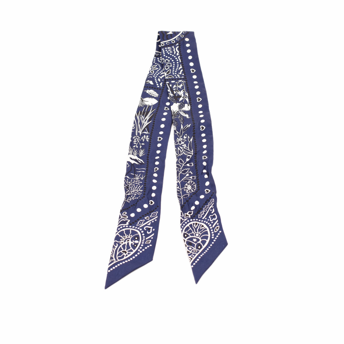 Blue and white patterned silk neck scarf with floral and geometric motifs. curated Pre-loved Luxury by Myluxe in Helsinki.