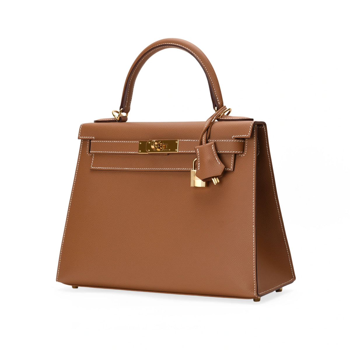 Brown leather Hermès Kelly bag with gold-tone hardware, curated Pre-loved Luxury by Myluxe in Helsinki.