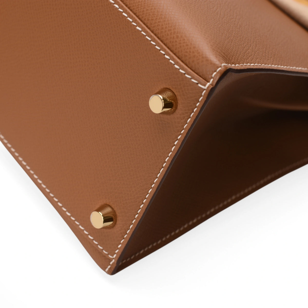 Close-up of tan leather bag base with gold-tone studs, curated Pre-loved Luxury by Myluxe in Helsinki.